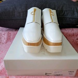Stella McCarteny White and Gold Platforms